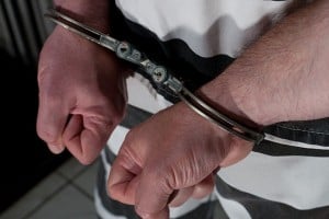 handcuffed inmate